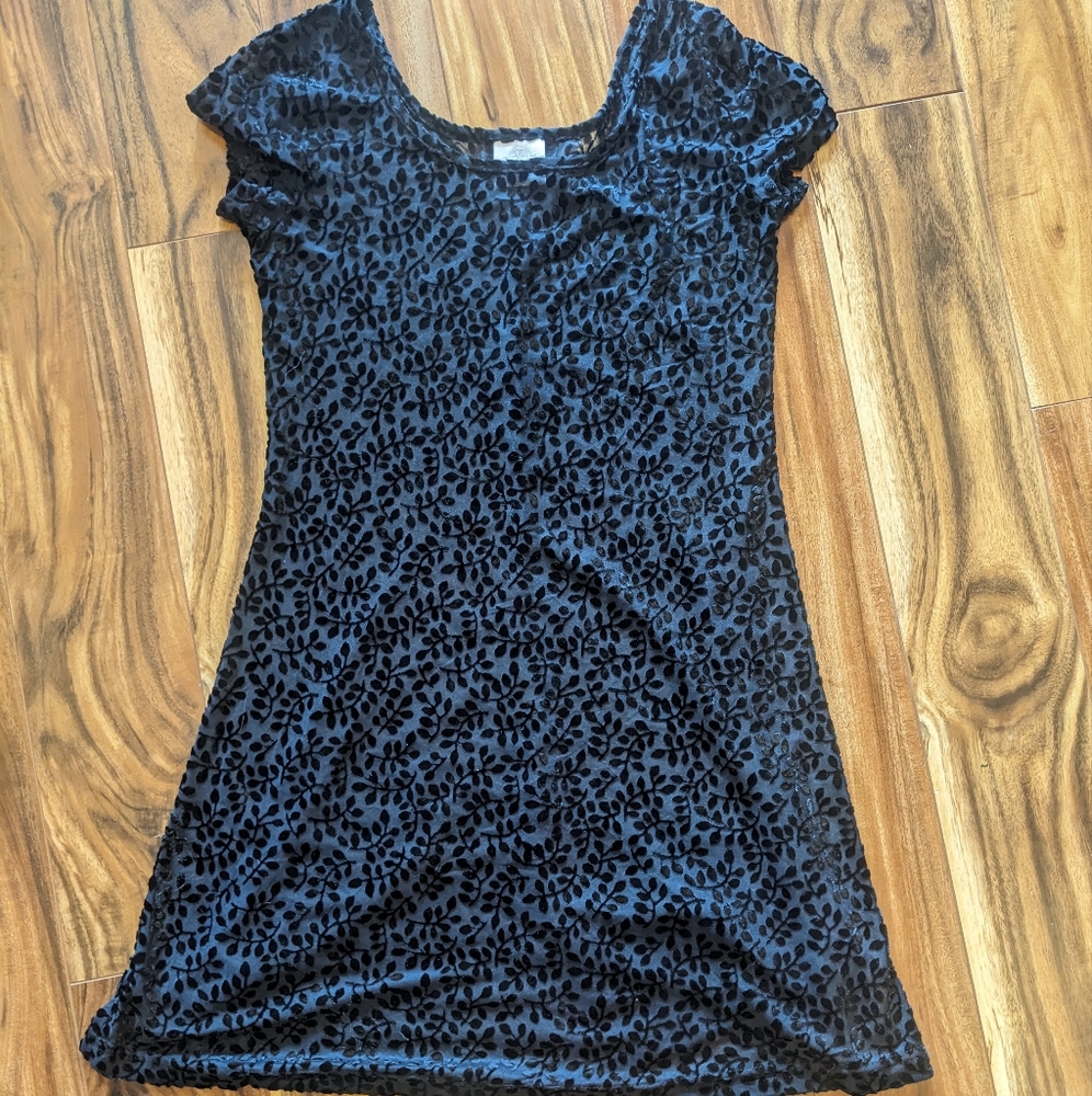 Black velvet leaf print dress with a touch of whimsy. Brand is Carol le Valley